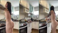 Vea la llama de vino desnudo en la cocina